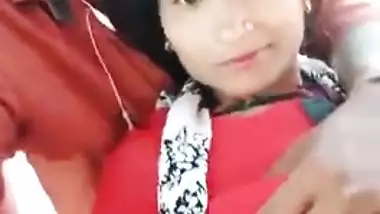 Handsome young man paws Indian's perfect boobs through red dress