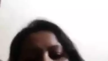 Desi mom simply sits in front of camera and talks with serious face