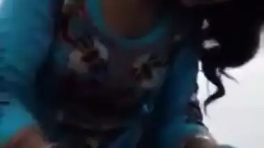 Indian gal puts condom on BF's erect XXX rod making it ready for sex