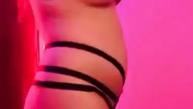 Enticing young woman reveals private parts posing in XXX lingerie